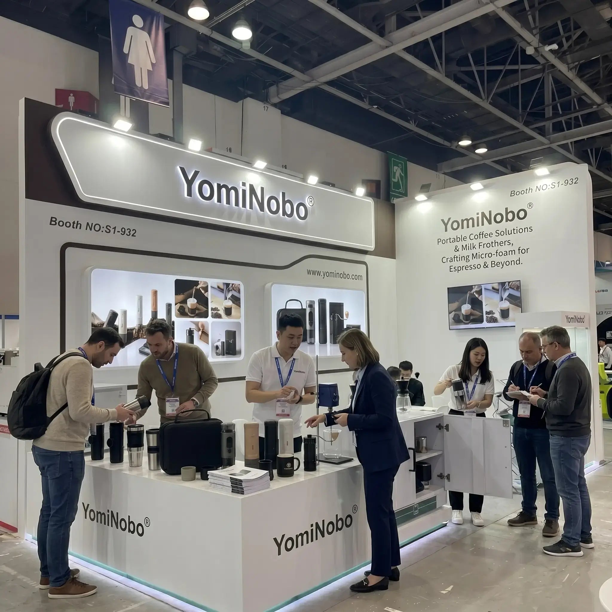 YomiNobo trade show booth showcasing portable espresso machine product lineup