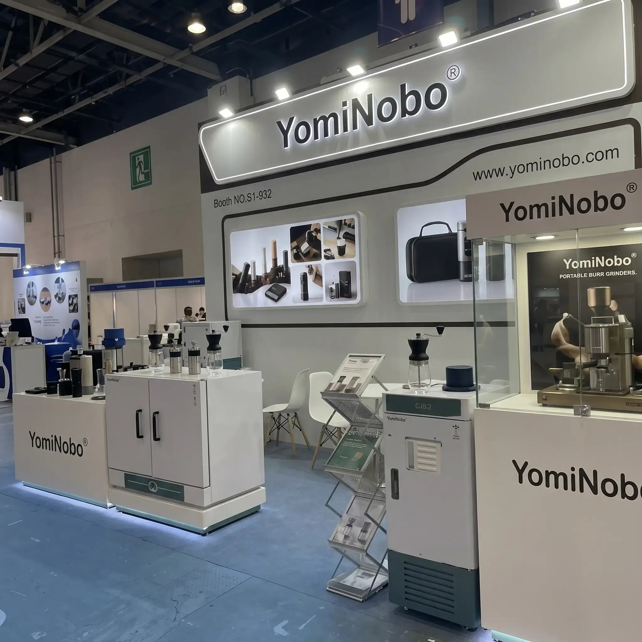YomiNobo white exhibition booth displaying portable espresso machines at trade fair