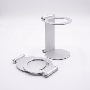 Silver foldable metal espresso machine stand shown in upright and flat positions