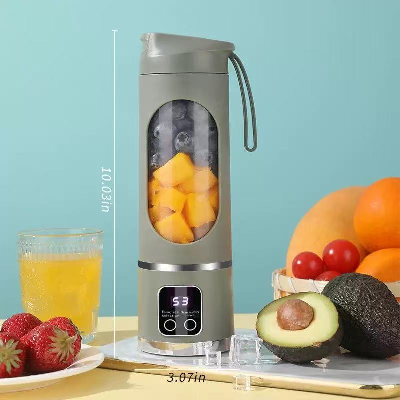 YomiNobo Portable Blender green with mango chunks inside showing size dimensions